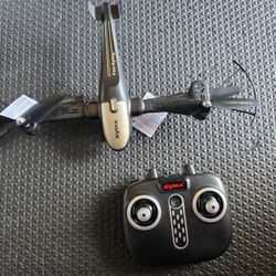 Zyma x700w foldable drone