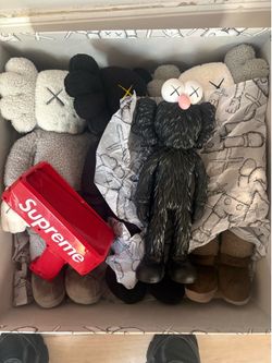 Kaws , supreme money gun Elmo kaws