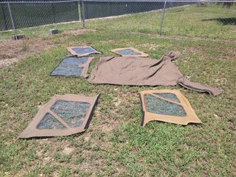 Jeep soft top with doors and windows. No hardware. Fits 1979 CJ Jeep and other models. Color Spice. In good condition.