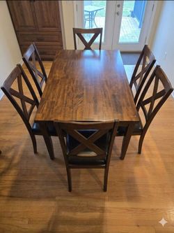 Cherry brown table with 6 chairs