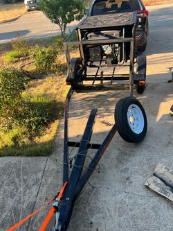 12,500/9,500-Watt Remote Electric Start  and Propane Powered Portable Generator w/ 50 Amp Outlet, CO Sensor will trailer