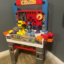 V tech drill and learn work bench.