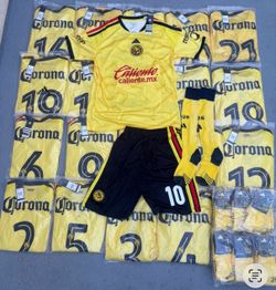 20 sets Club America home and away and Barcelona Soccer uniforms ready to pick up or i can ship them any where in the US 40$ each set includes jerseys