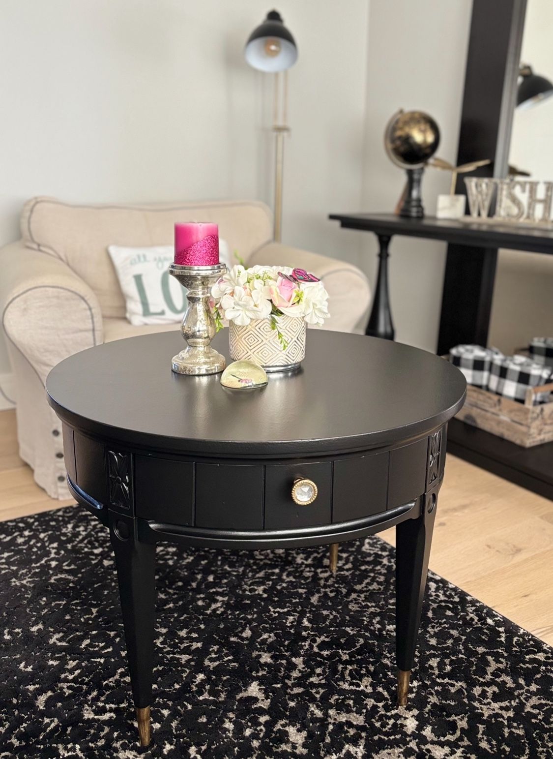 Black Round Table with Gold Tipped Legs 28’W x 22’Tall