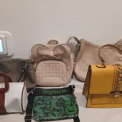 Different purses handbags and totes gently used and some Never used