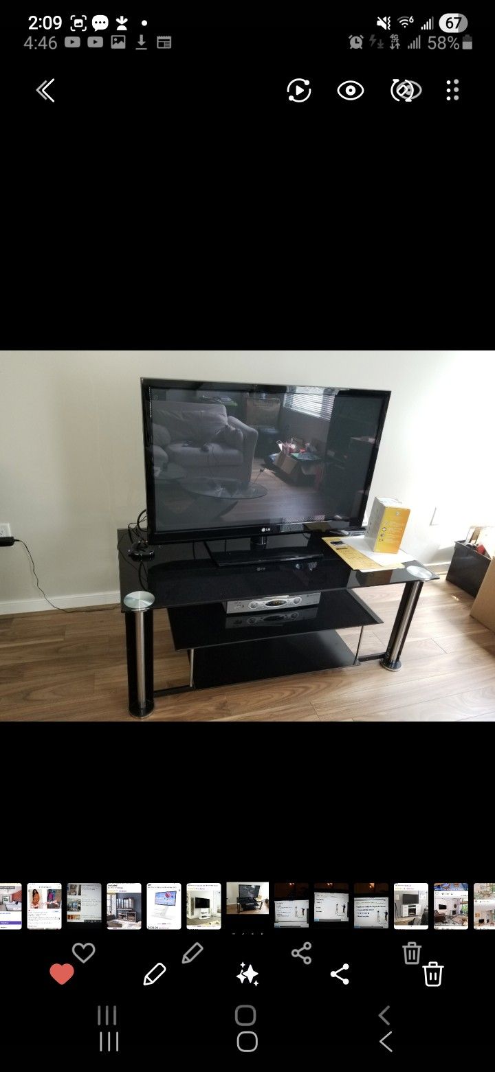 TV & Black Glass TV Stand