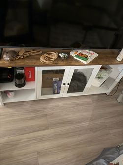 White and Wood TV Stand with Glass Doors