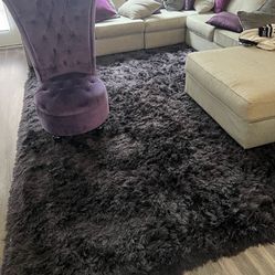 Sectional with Rug And Accent Chair Included.