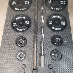Olympic Weight Set With Olympic Bar & Curl bar..210lbs all together read Description below...