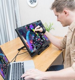 Complete digital artist set up laptop and 22 inch tablet to draw with