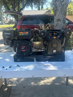 portable gas-powered air compressor featuring a Loncin 196cc gasoline engine.