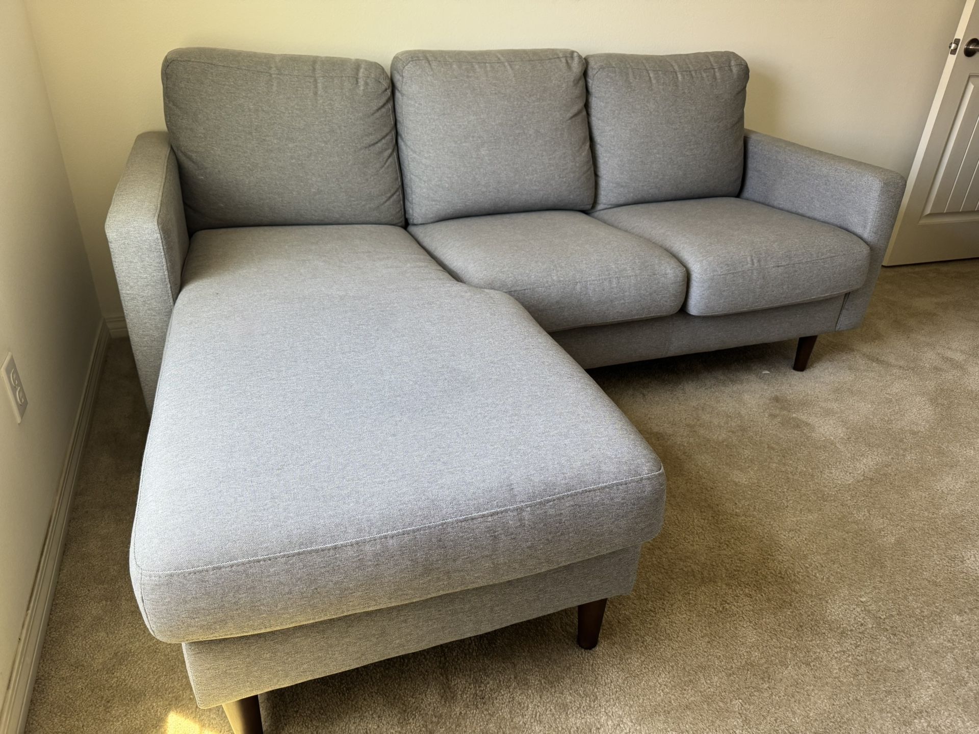 Living spaces - Grey Couch
