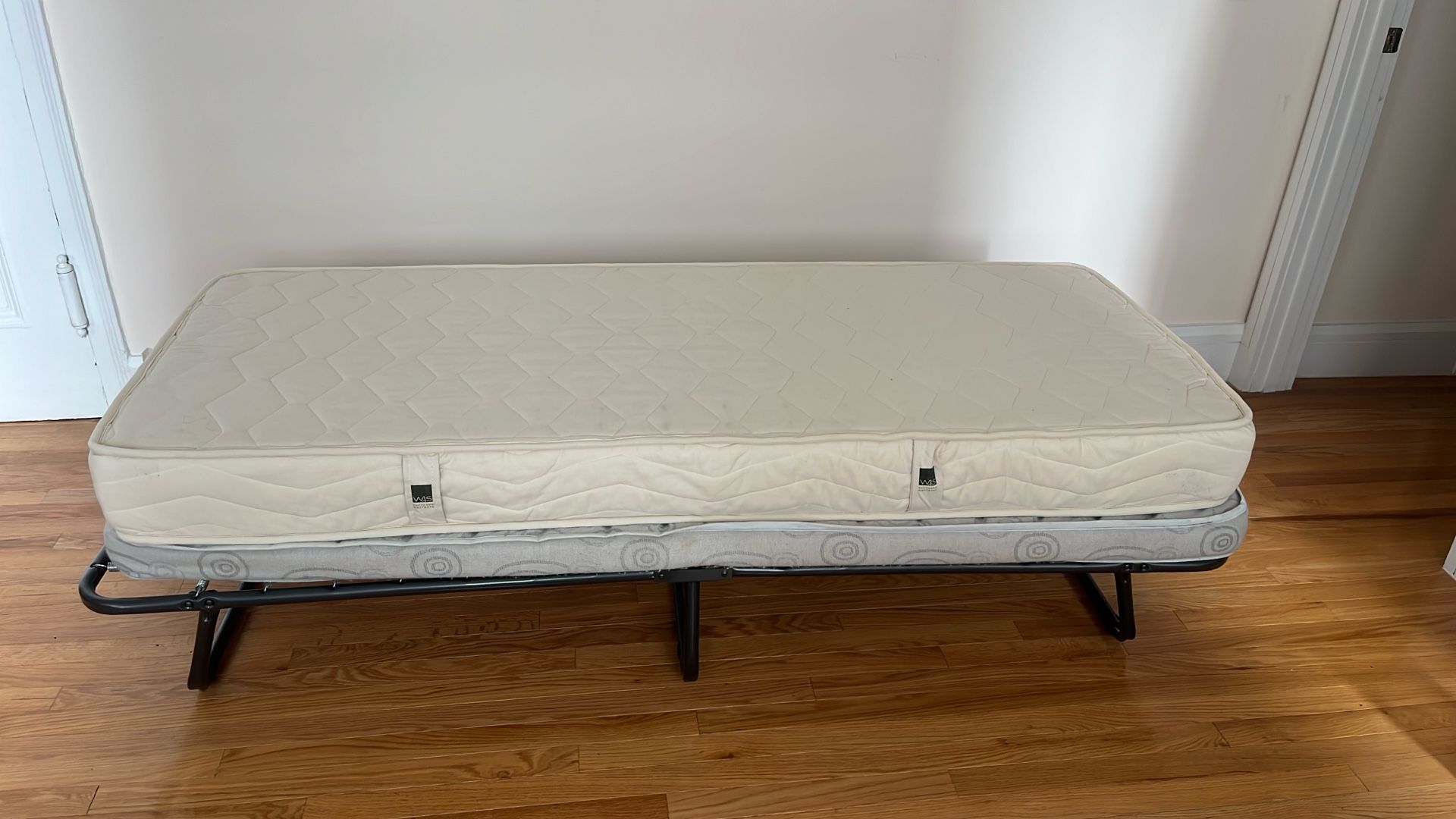 Collapsible Twin Bedframe, Mattress and Mattress Pad