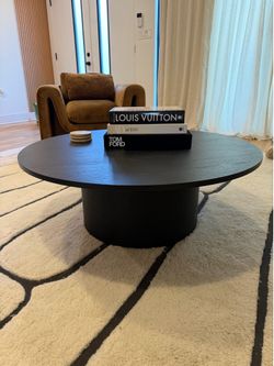 Black coffee table with books (comes with an extra top)