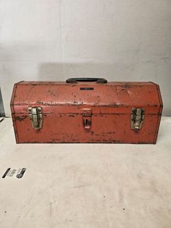 vintage red metal hip-roof toolbox