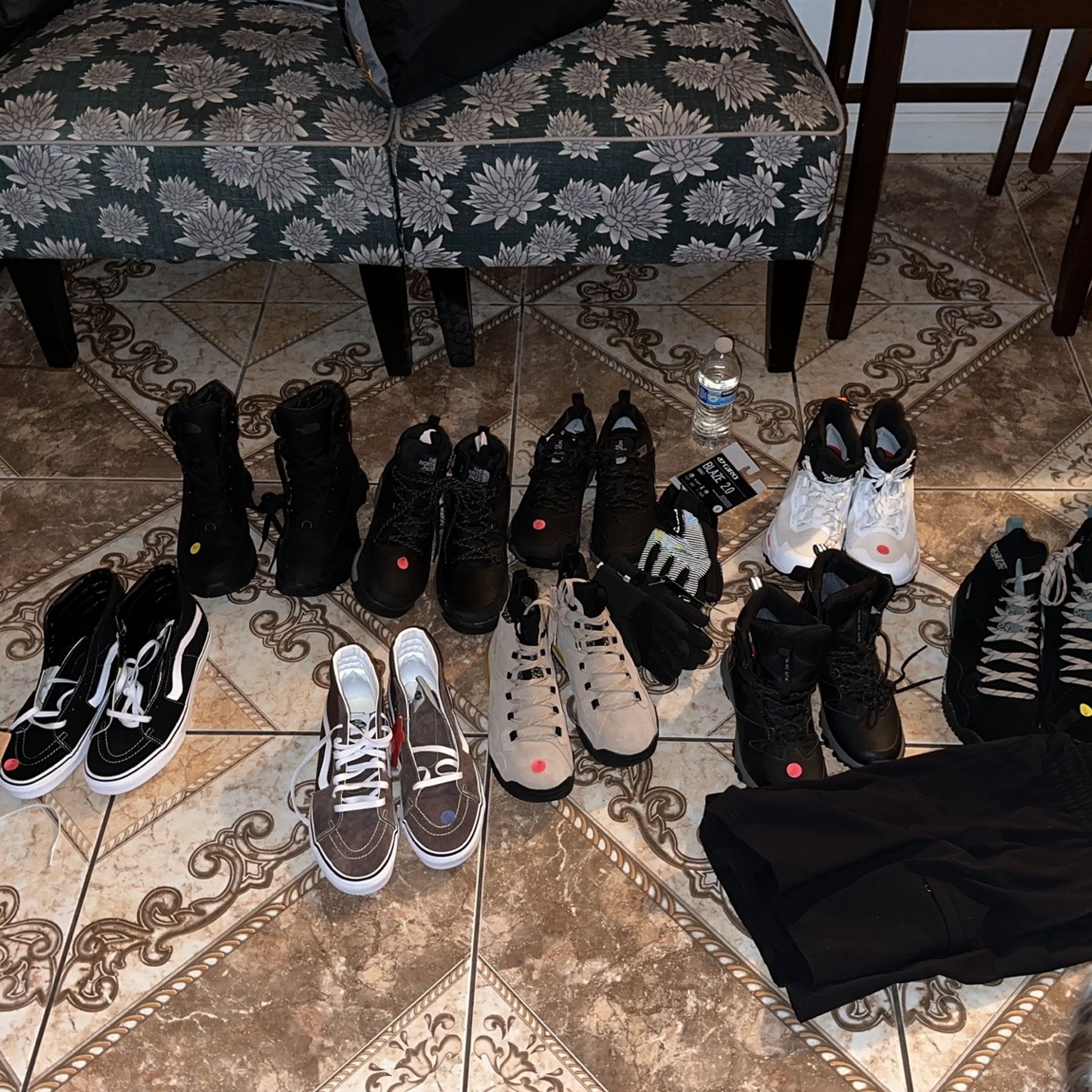 Arrangement Of North face Shoes And Some Vans