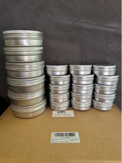 Brand New tins 1 ounce & 4 ounce