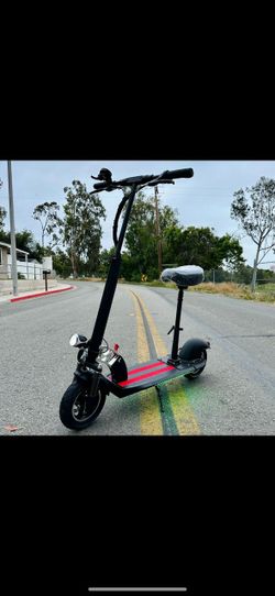 BRAND NEW ELECTRIC SCOOTER