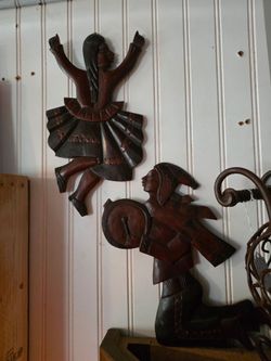 Hand carved wooden dancers.