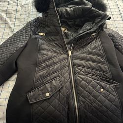 Woman’s Michael Kors jacket size XL