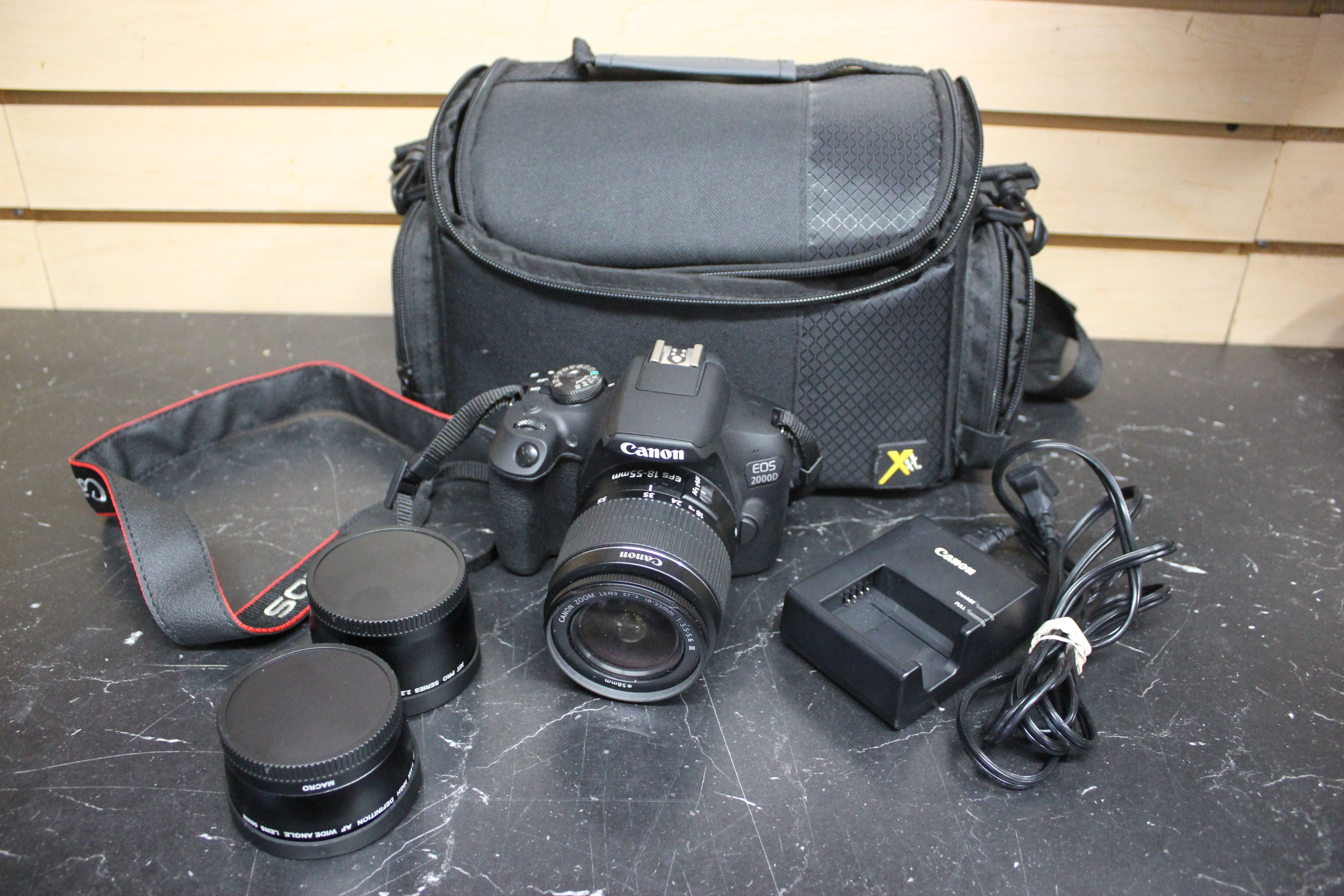 Canon EOS 2000D DSLR Camera W/ EF-S 18-55mm Lens & accessories