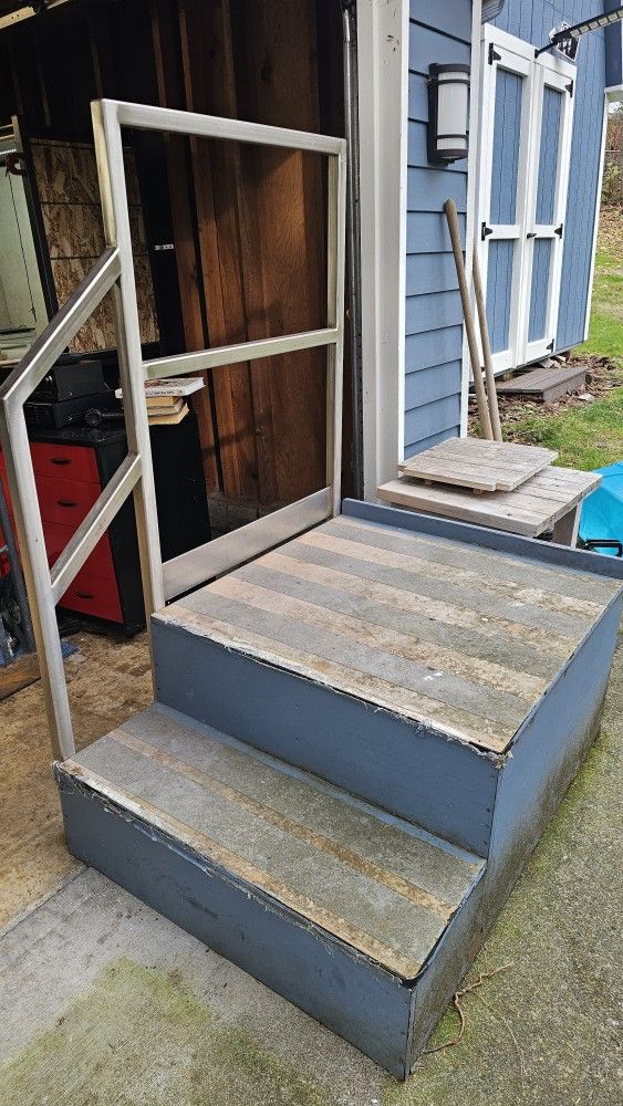 Set of solid stairs with stainless steel handrail from Weyerhaeuser