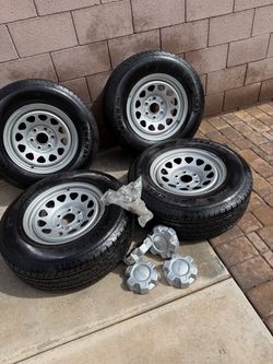 GMC Steel Wheels with General Tires Set of 4