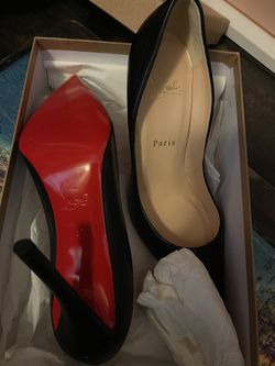 Black louboutin pumps