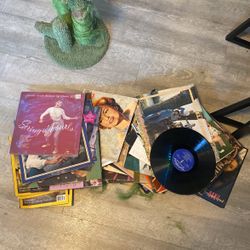 record player three clocks and 20+ records 