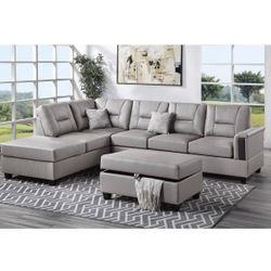3 Piece Reversible Sectional With Storage Ottoman In Light Grey Faux Leather Brand New In Box Firm Price $699
