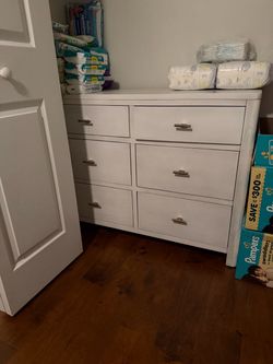 White dresser with gold handles