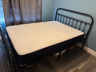 Queen Metal Bed Frame only. New in box