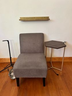 Grey armless chair