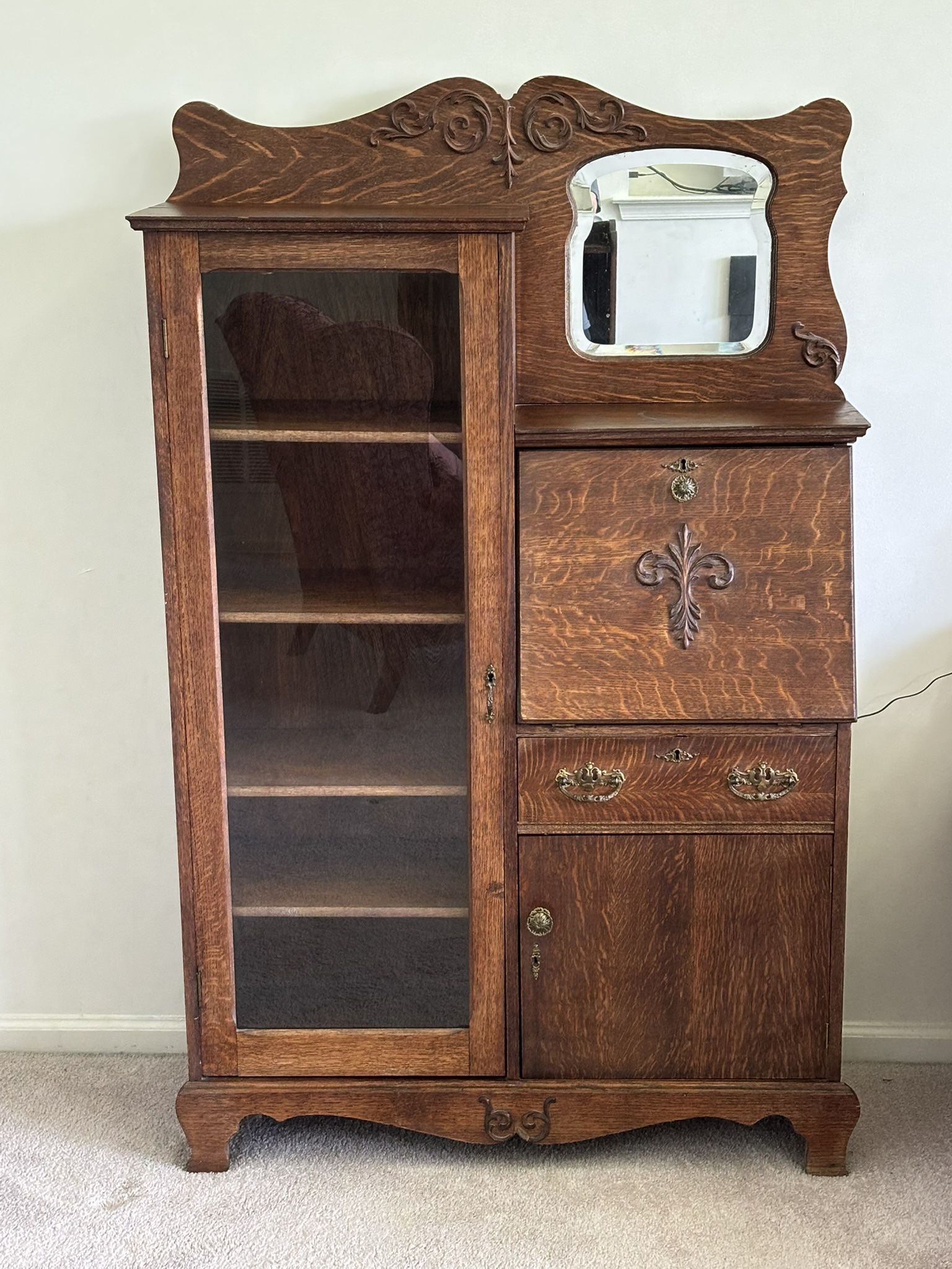 Vintage Antique Side-By-Side Tiger Oak Secretary Desk, with glass front bookcase and 6 total shelves, drop front desk writing surface, mirrored secti
