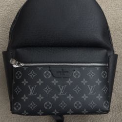 Discovery monogram backpack