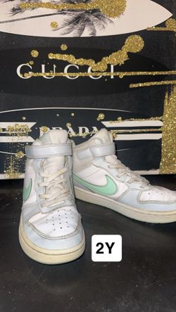 👟 Nike High-Top Sneakers – Size 2Y White and mint green Nikes 🩵 Light wear visible, still in good condition. Velcro + laces for easy fit. 15 OBO 