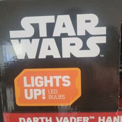 Star Wars Darth Vader hand with lightsaber