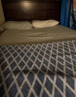 Wood bed with mattress