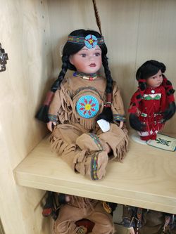Indain Doll Sits 11" Tall W/ Frathet 16" Tall. Timeless Collection