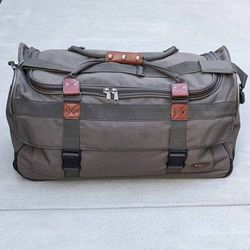 28" large heavy duty canvas rolling duffel bag with retractable handle and over the shoulder strap