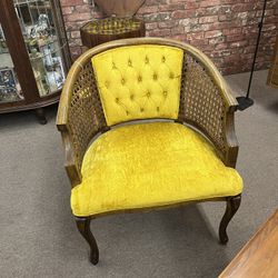 Cane and Gold Tufted arm chair