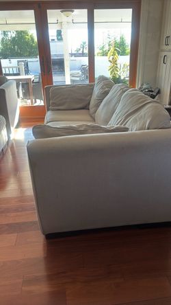 Ashley Furniture Sofa + Oversized Chair – Beige/Gray
