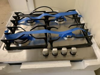 Brand new Whirlpool 24in. Gas cooktop with 6 months warranty
