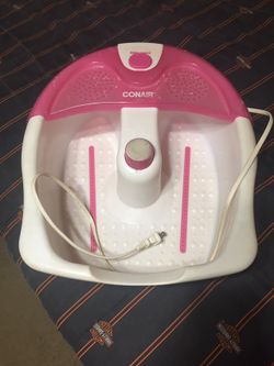 Conair Foot Massager. Vibrates And Keeps Water Heated To The Temp Of The Water You Put In It .