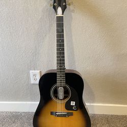 Acoustic Guitar Needing A New Owner