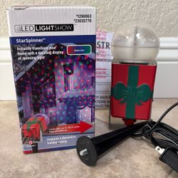 Two StarSpinner LED Light Show Christmas Decor