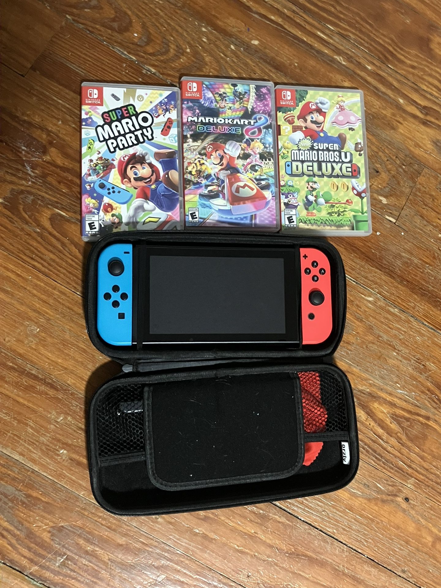 Nintendo Switch + Accessories And Games 