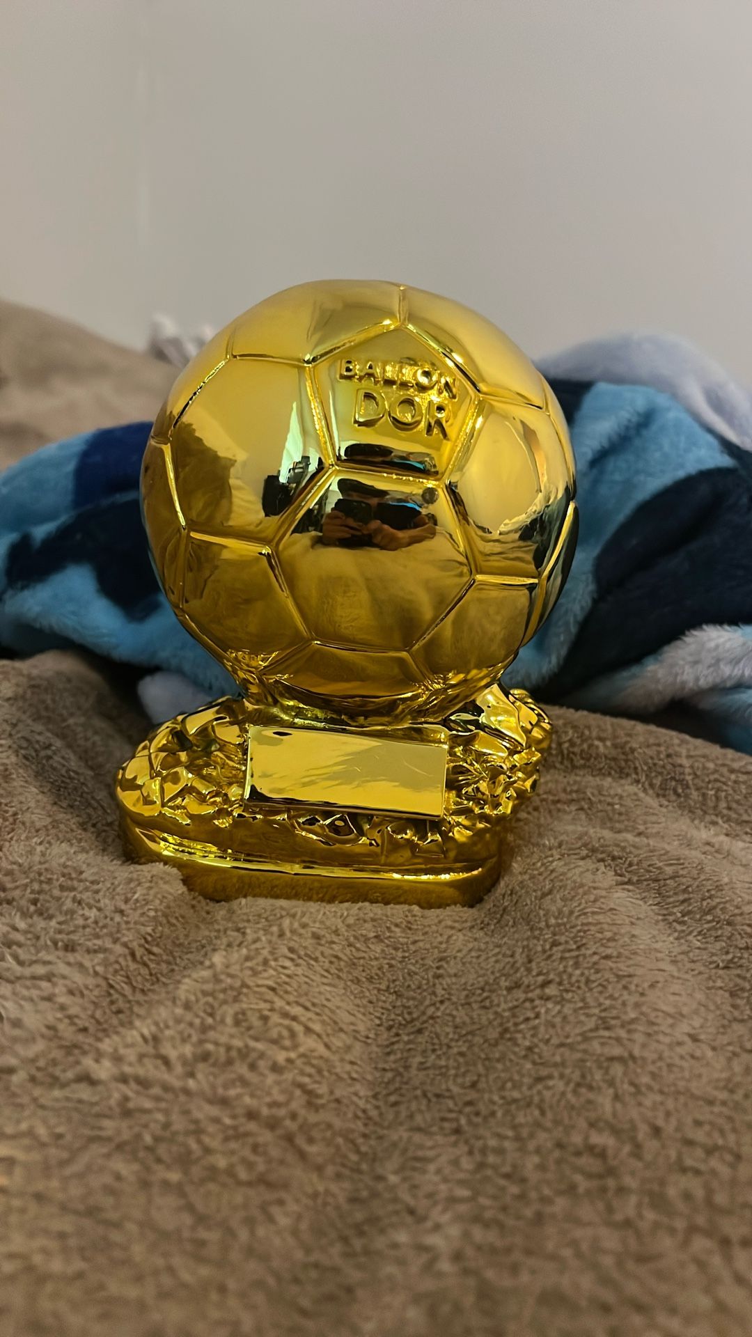 Gold soccer trophy