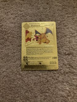 “GOLD CHARIZARD” GOLD POKEMON