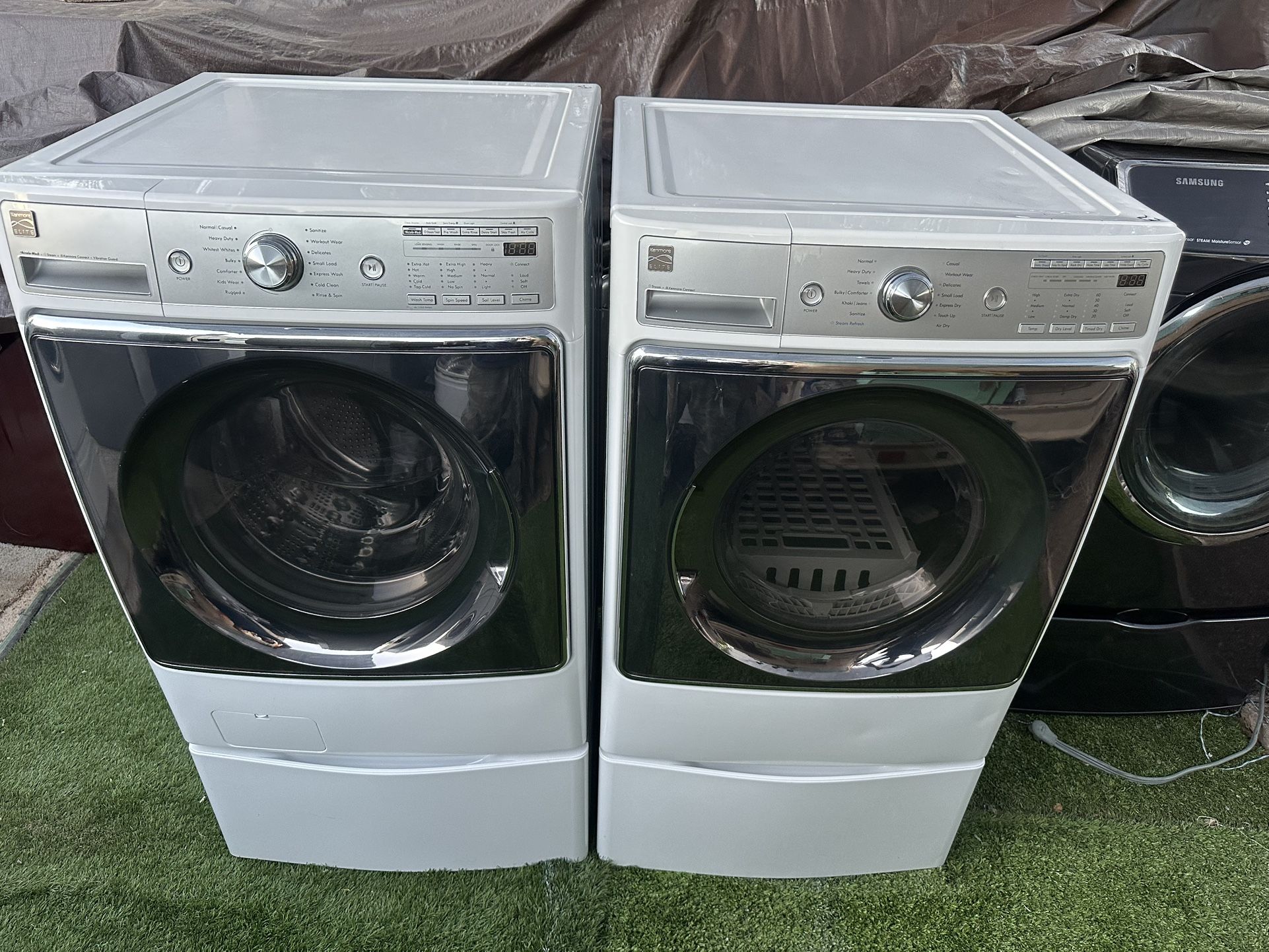 Kenmore Elite Steam jumbo washer and electric dryer on pedestals